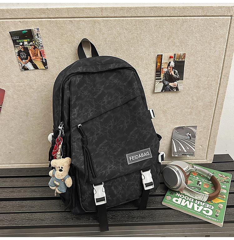 School bag 2025 new backpack light leisure simple outdoor travel backpack junior high school large capacity versatile school bag