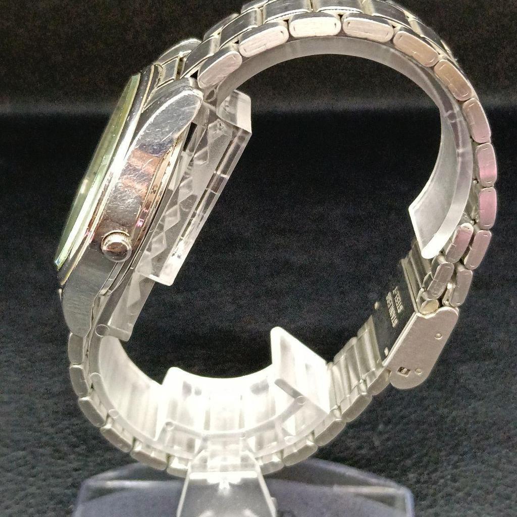 Used Working condition: ALBA men's wristwatch, solar-powered, date display, 10 bar water resistant