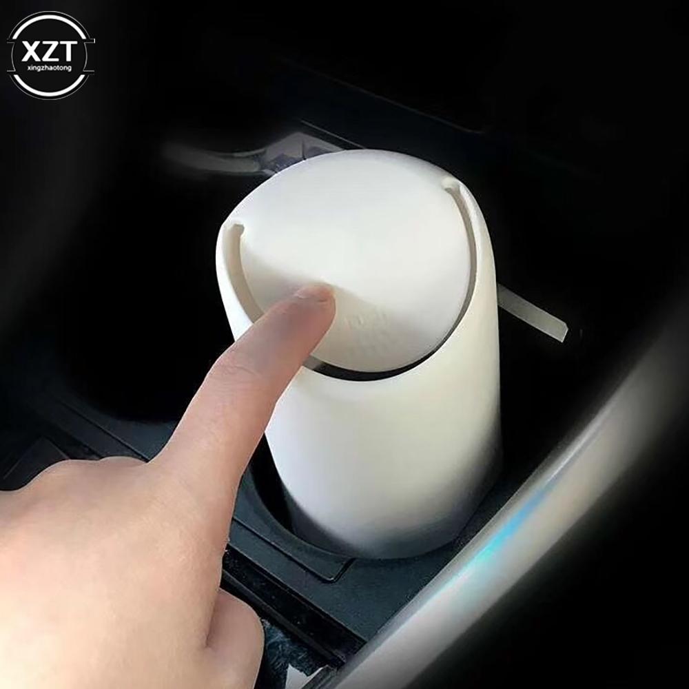 Mini cubo de basura para coche, caja de almacenamiento organizadora automática, soporte para estuche de basura de silicona, cubo de basura para coche