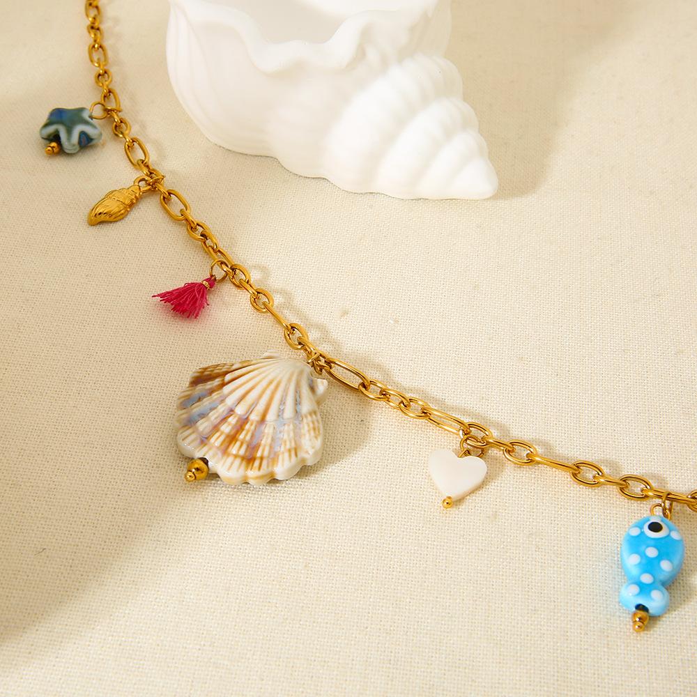European and American ceramic tropical fish shell fringed pendant necklace stainless steel plated 18k gold waterproof collarbone chain female