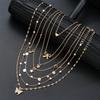 Ensemble de bijoux collier multicouche papillon perle couleur or 7 pièces pour femme tendance étoile cœur d'amour nœud papillon pendentif zirconium
