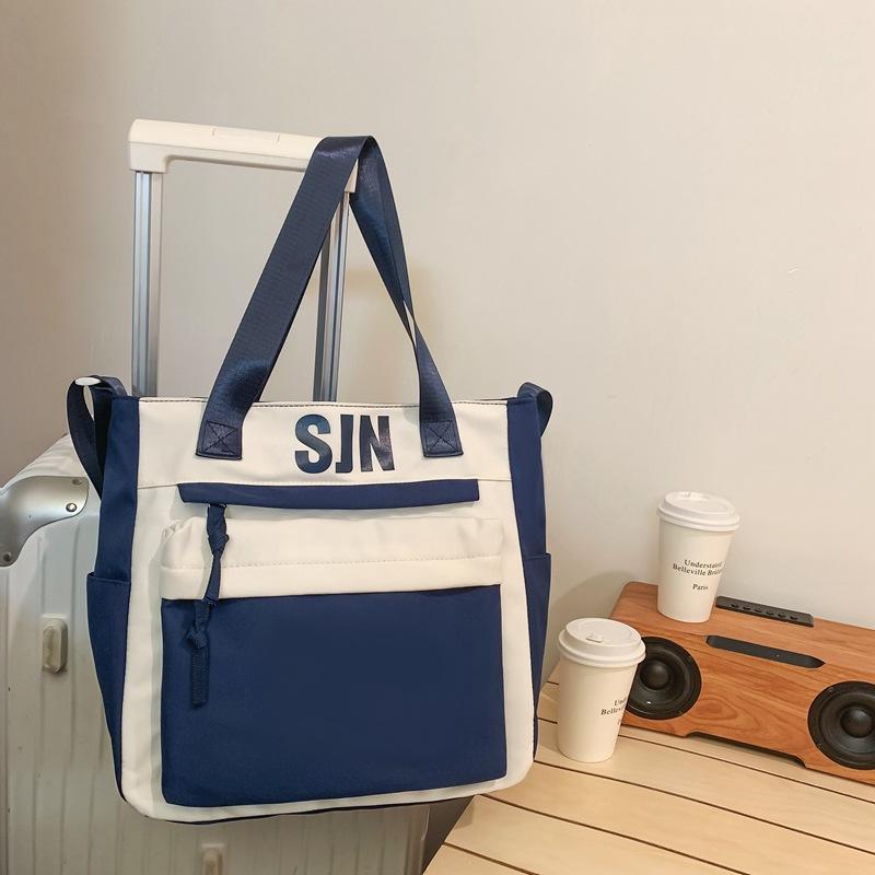Schoolbag Japanese simple and fashionable backpack 1011 summer new middle school schoolbag college student college style alphabet backpack