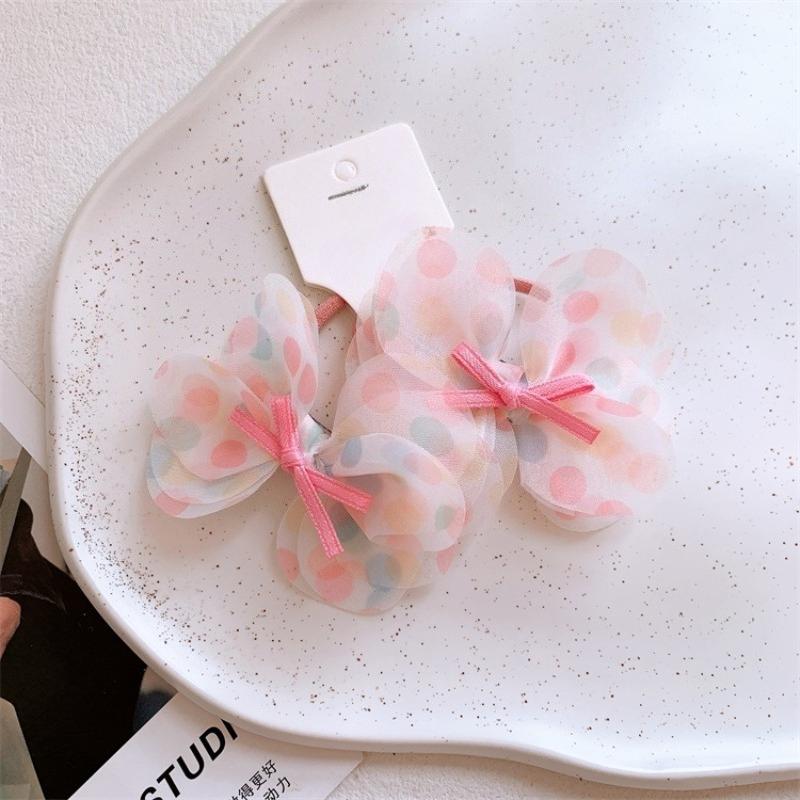 Spring new bow hair ties for girls. Sweet tulle polka dot design, 3D bowknots, hair-friendly elastic bands.Perfect for ponytails