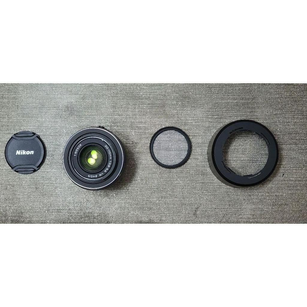 Used Nikon 1 NIKKOR VR 30-110 with protector