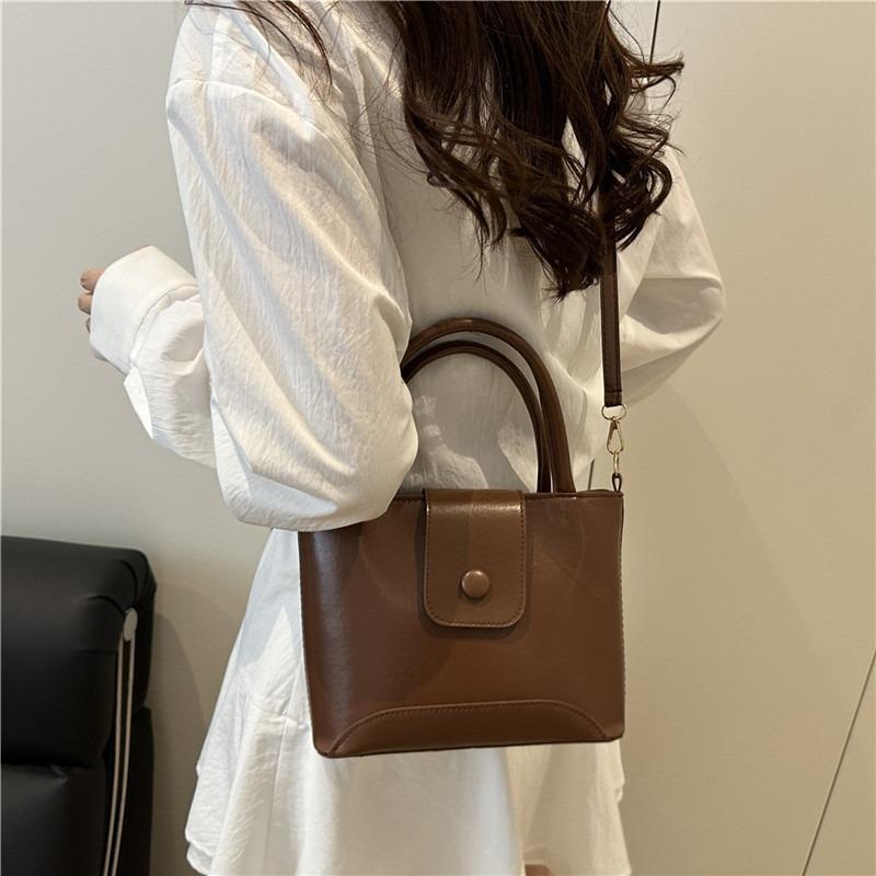 Premium simple niche fashion handbag women's summer new bucket bag single shoulder oblique span women's bag