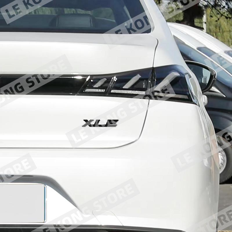 FVEX7 LE XLE XLS Badge Car Head Trunk Body Sticker Decal Emblem Accessories For Toyota Corolla Yaris Camry Auris Rav Metal Car Styling