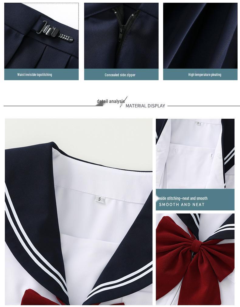 Námořnická dvoudílná JK uniforma v tmavě modré a bílé barvě s dlouhým rukávem a plisovanou sukní na jaro/podzim