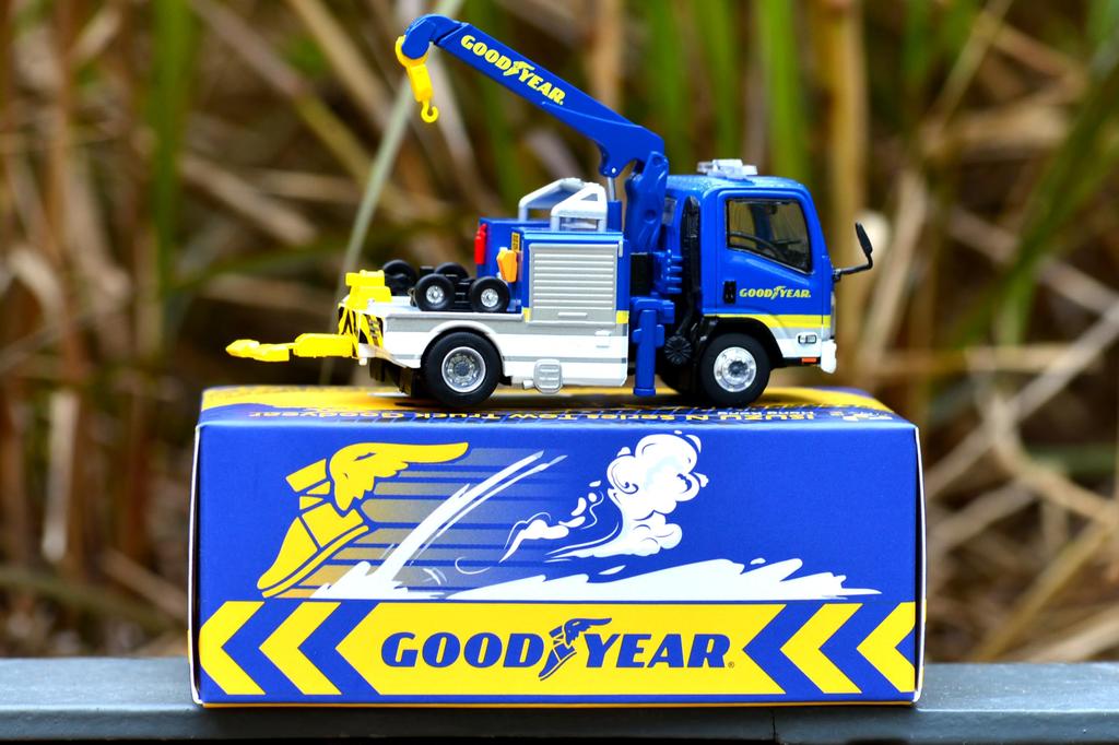 Tiny City 1/76 scale diecast model car of the Isuzu N-Series Tow Truck by Goodyear