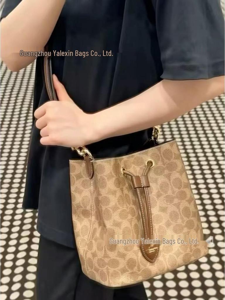 Coach Rowan22 Kabelka typu bucket z pravé kůže - Všestranná retro květinová kabelka do ruky a crossbody