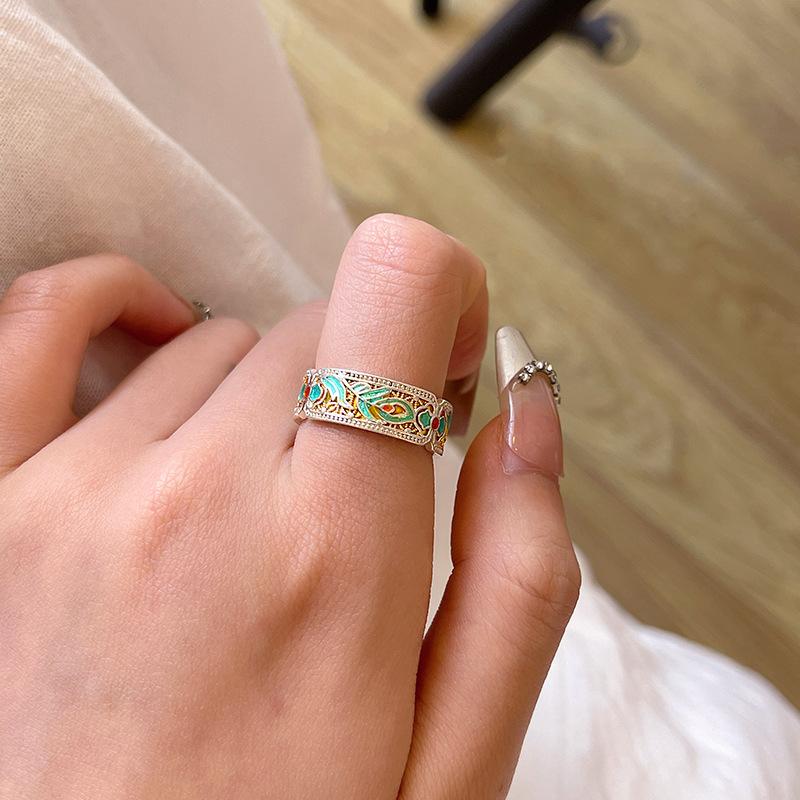 

Retro enamel gold-painted wind feather open ring women s unique niche new Chinese ring ring design sense jewelry Adjustable opening