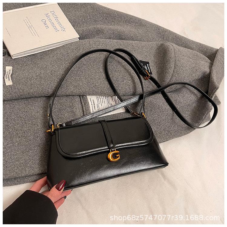 Retro soft leather shoulder armpit bag women's 2025 new versatile fashion handbag casual baguette bag