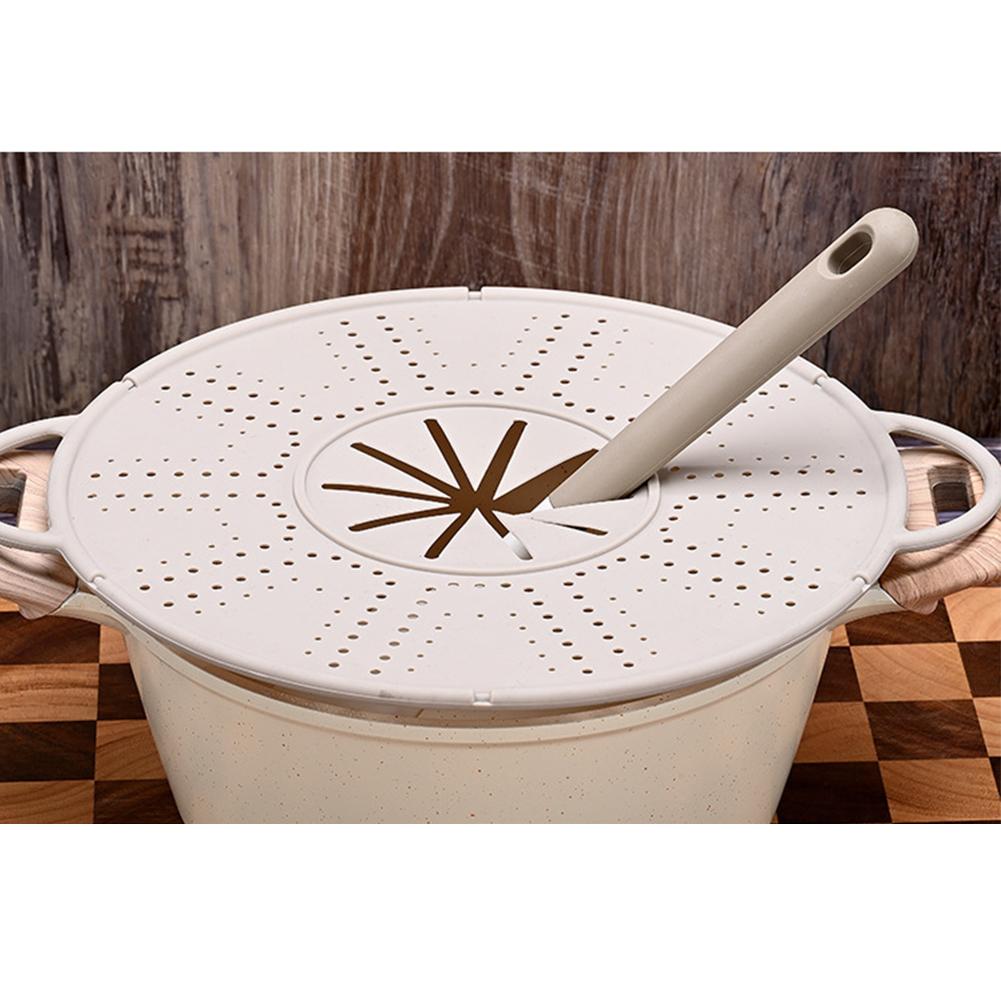 Easily Storeable Silicone Pot Holder That Doubles As a Spill Stopper Tool