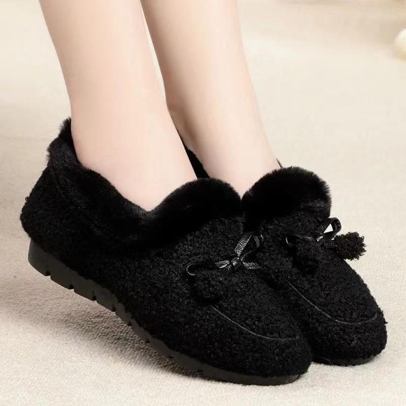 A piece of piled and thickened beanie shoes, women's lazy home shoes with one foot, warm flat-bottomed fluffy cotton shoes