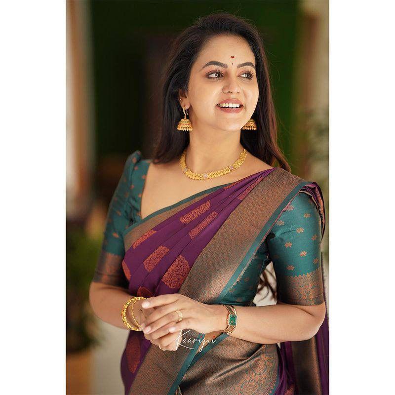 Silk Saree from the ALMAARI Store Is Adorned with Beautiful Zari Work In Form of Traditional Motifs.