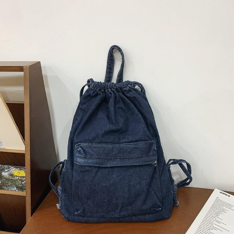 

Japanese canvas backpack men s bundle drawstring denim backpack light casual mountaineering bag female student schoolbag темно-синього кольору