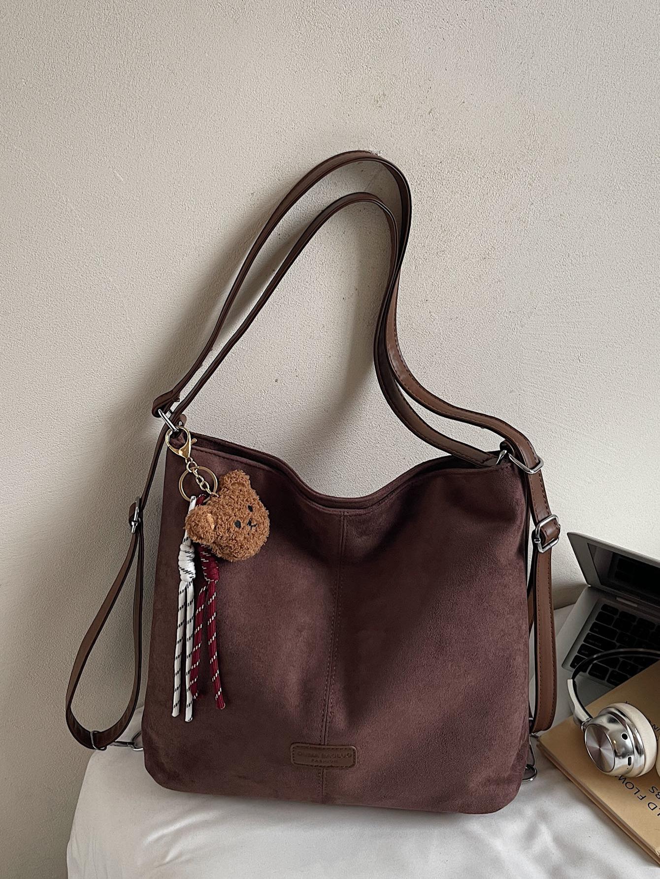 

Autumn and winter new large-capacity shoulder bag armpit bag women s fashion trend texture tote bag versatile backpack темно-коричневого