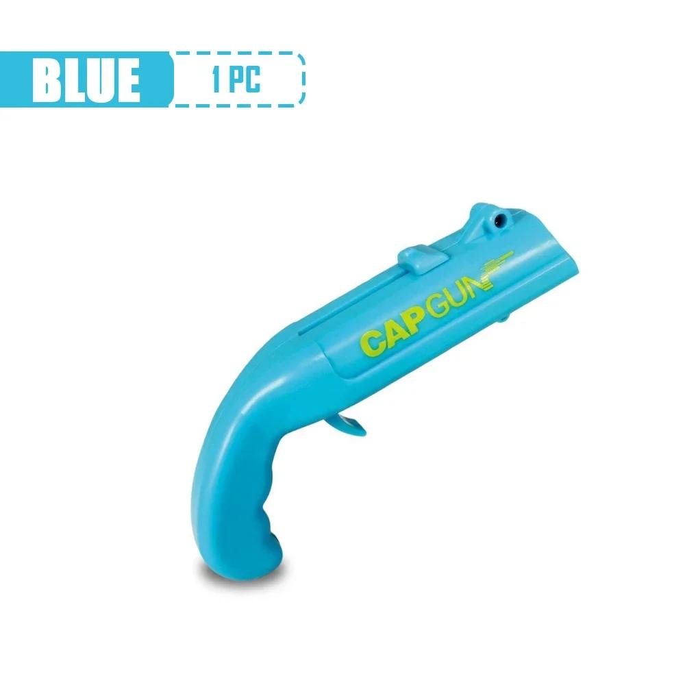 Zábavný otvírák na pivní láhve Pistole na uzávěry Přenosný odpalovač uzávěrů Bar Nástroj na otevírání nápojů Pistole ve tvaru víčka na láhve Střílečka Kuchyňské pomůcky