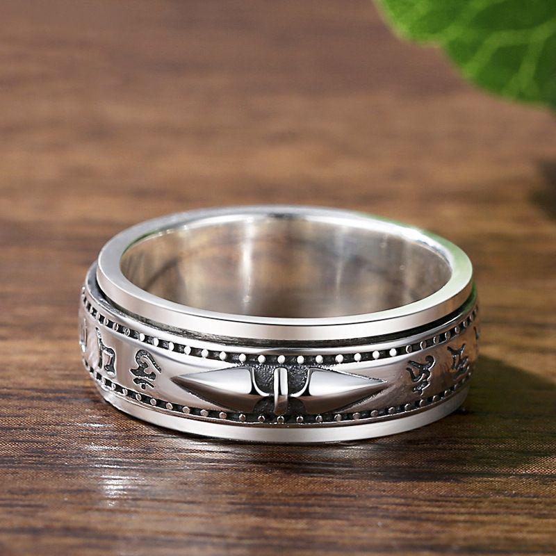 S990 Pure Silver Rotating Kylin Ring with Six-Character Mantra and Artistic Retro Design.