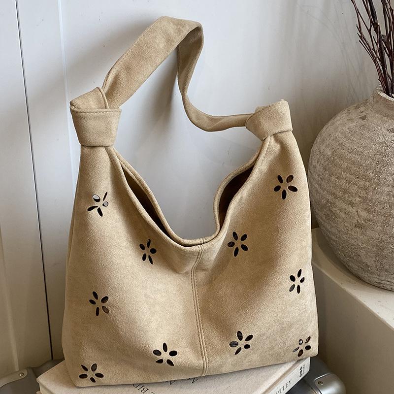 Tasche im College-Stil Damen lässige hohle Tragetasche ausländischer Stil Wildleder Umhängetasche Damen Pendler Achseltasche