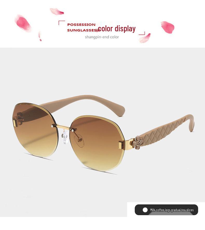 Women's Egg-Shaped Stylish Frameless Retro Sunglasses for Summer Photoshoots