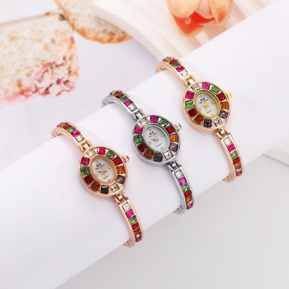 Elegant Petite Ladies' Wristwatch with Inlaid Gemstones