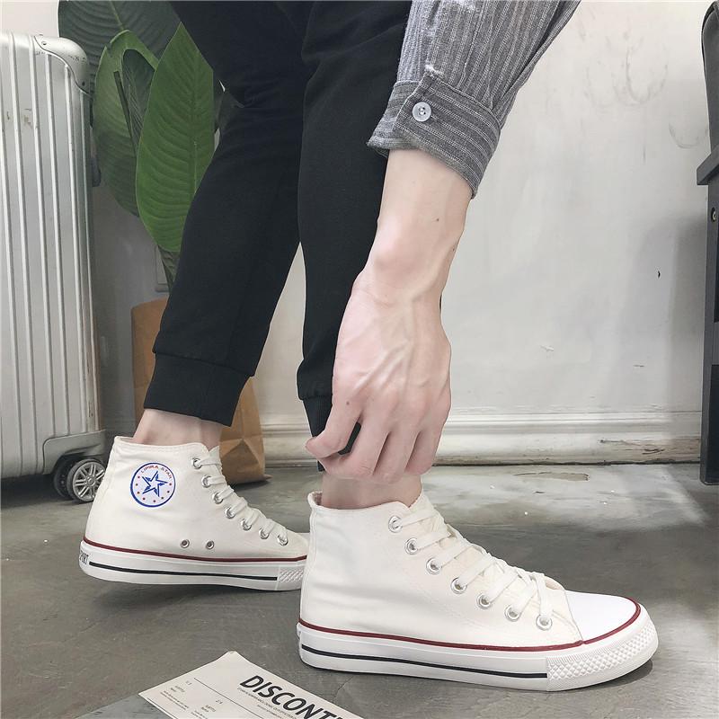 Wiosenne i jesienne nowe niskie buty męskie klasyczne płócienne buty męskie modne buty do chodzenia po mieście koreańska wersja uniwersalne małe białe buty męskie