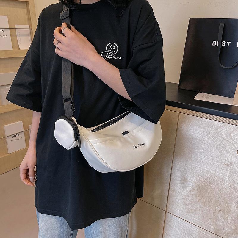 Japanese casual dumpling bag sports wind messenger bag women's large-capacity canvas bag students class shoulder commuting bag tide