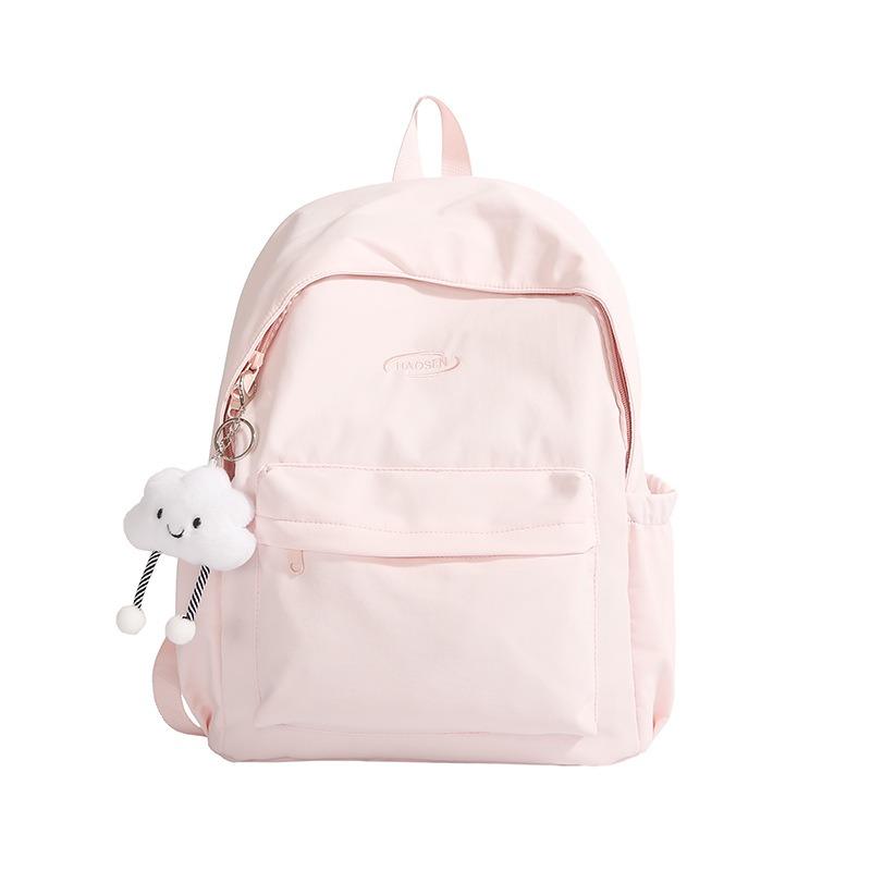 

A Simple and Fashionable Backpack with A Large Capacity and A High-quality Texture. It Is A School Bag for Senior High School Students розовый