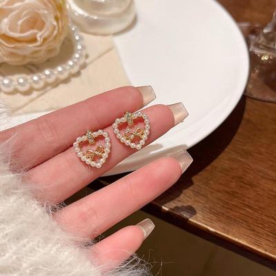Orecchini Coreani Dolci con Fiocco e Perla: Design di nicchia di lusso per donne