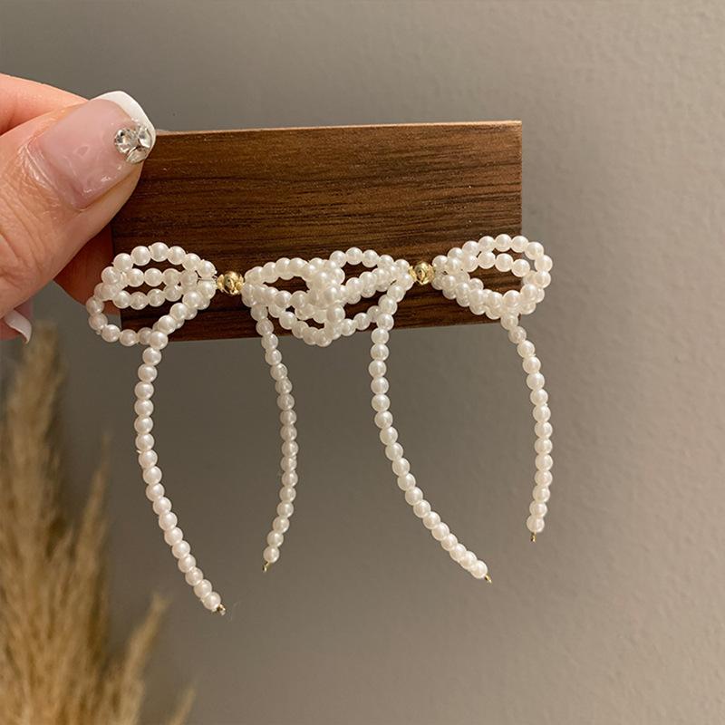 Witte Strik Imitatie Parels Kwastje Hangende Oorbellen voor Vrouwen Temperament Veelzijdige Mode Oorbel Elegante Sieraden Groothandel
