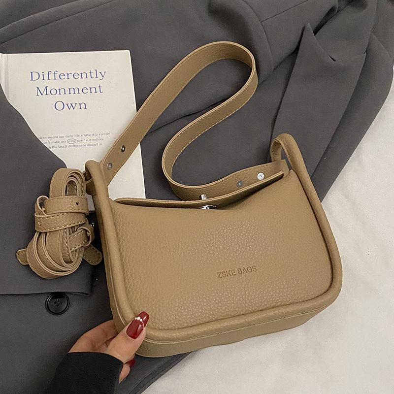 

Fashion and popular temperament simple style lychee pattern pillow bag women s high sense versatile commuting solid color shoulder messenger bag