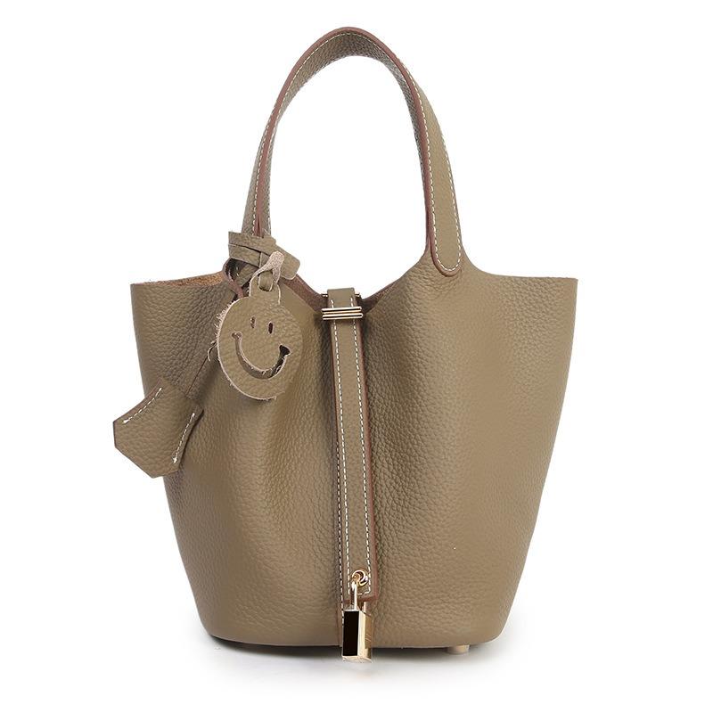 Erste Schicht Rindsleder Tasche Damen neue Retro vielseitige Handtasche echtes Leder Damen Tasche Gemüsekorb Beuteltasche