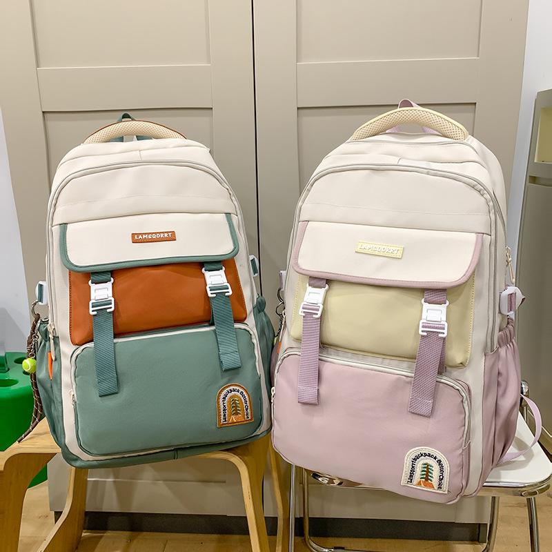 New large-capacity contrasting color schoolbag, waterproof protection for campus students, durable and lightweight backpack, trend research backpack.