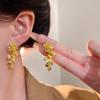 Elegante High-End Metallische Blatt Lange Quaste Blume Ohrringe für Frauen