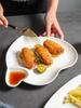 Kreativ dumplingtallrik i japansk stil med såsskål