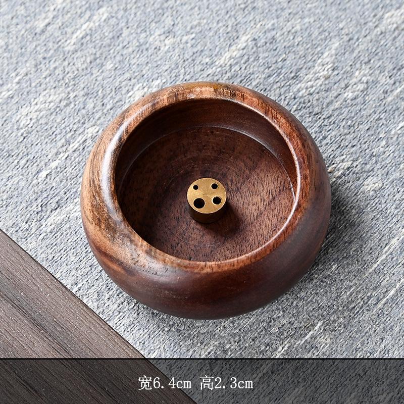 

Подставка для благовоний из черного дерева с пористым основанием