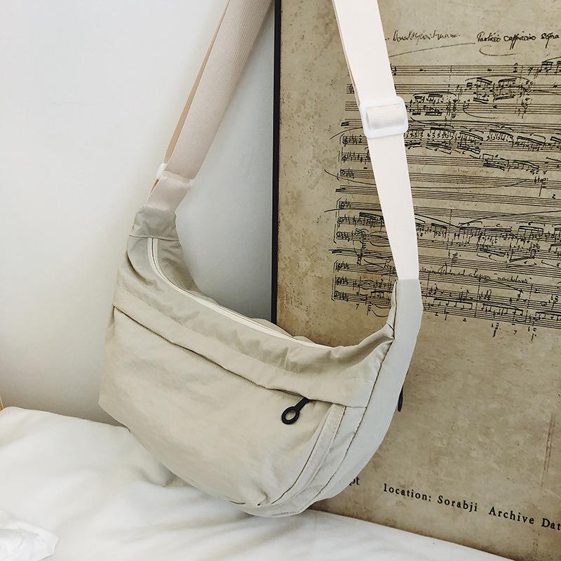 Casual crossbody bag girls lightweight shoulder canvas bag waterproof commuting solid color versatile nylon dumpling bag for men