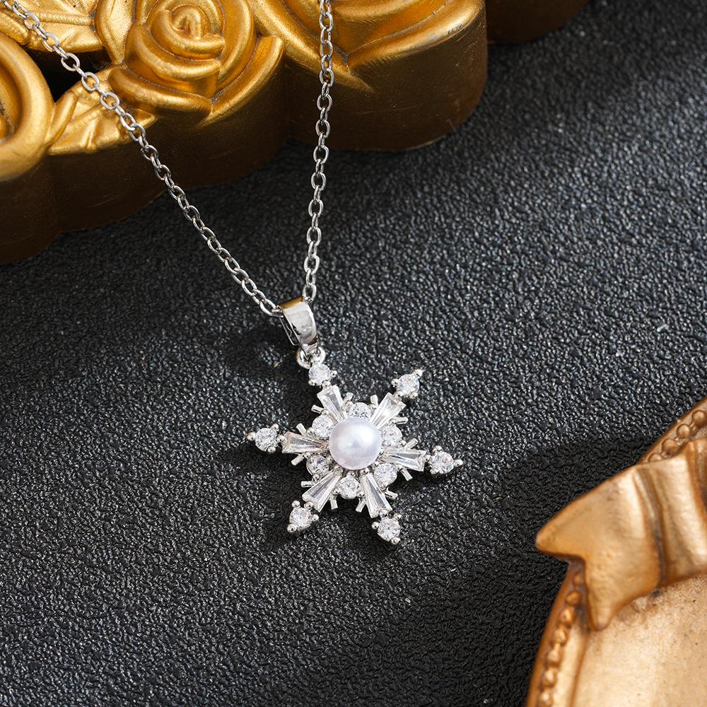 

Cross-Border European & American Pearl Snowflake Titanium Steel Necklace: Women s Clavicle Chain with Niche Design