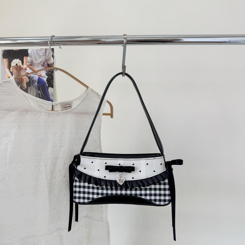 

Casual fashion sweet bow underarm bag women s 2025 summer simple niche high-value shoulder handbag чорний