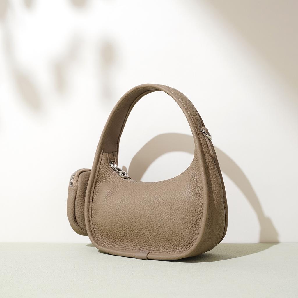 Neue kleine Tasche, Premium-Handtasche, Ein Schulter, Unterarm-Crossbody-Halbmondtasche, Kopfhörertasche.