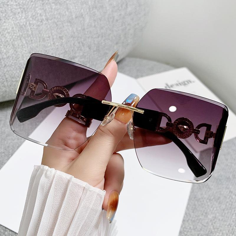 

Classic Curved Lens Rimless Sun Glasses Glasses Ladies For Men Luxury Designer Style Style Sun Eyeglasses Punk Popular Vintage Hollow Big Spectacle