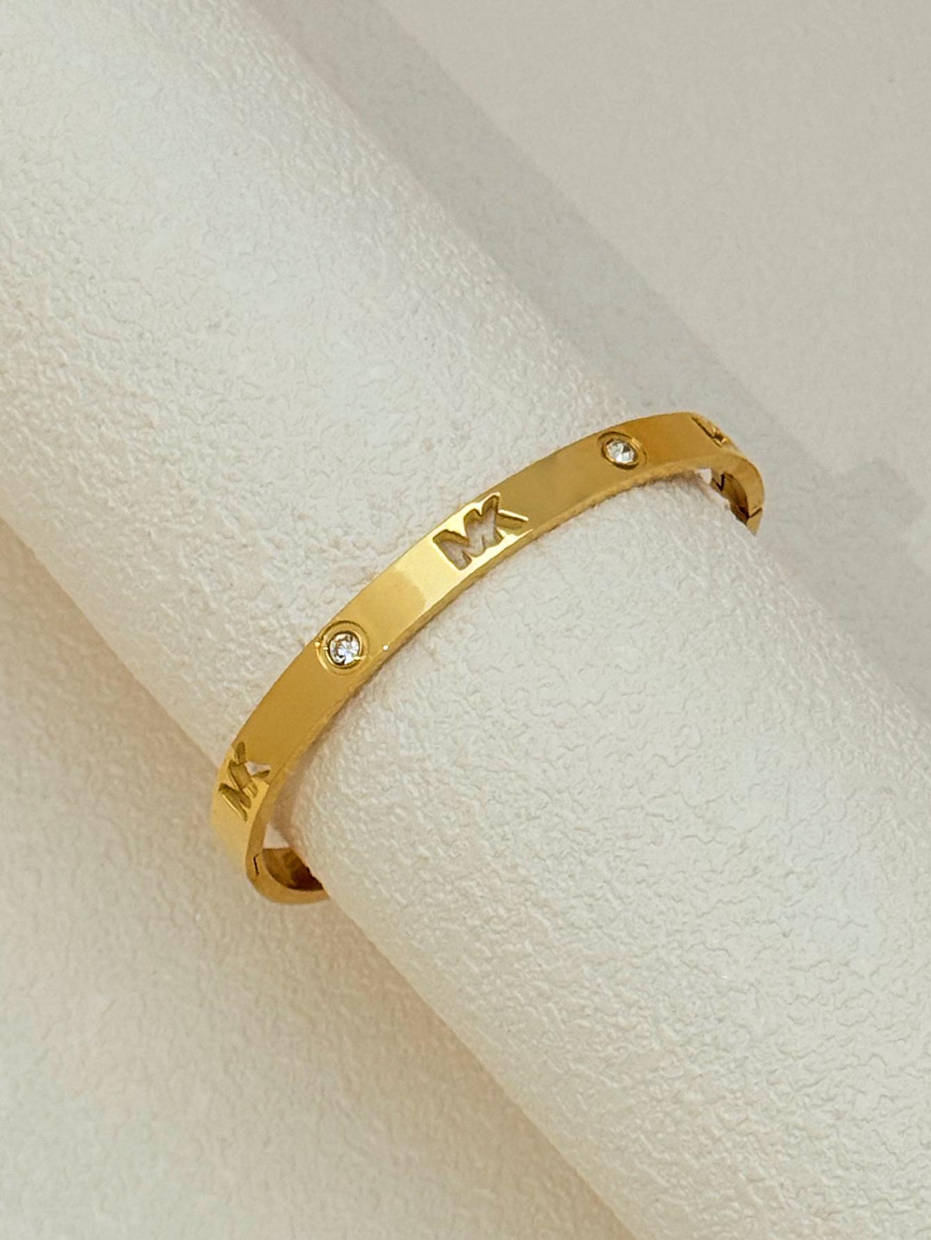 

Жіночий браслет з нержавіючої сталі кольору рожевого золота 18 каратів з титанової сталі із застібкою-цвяхом - прикраса, що не тьмяніє 18K Vacuum Plated