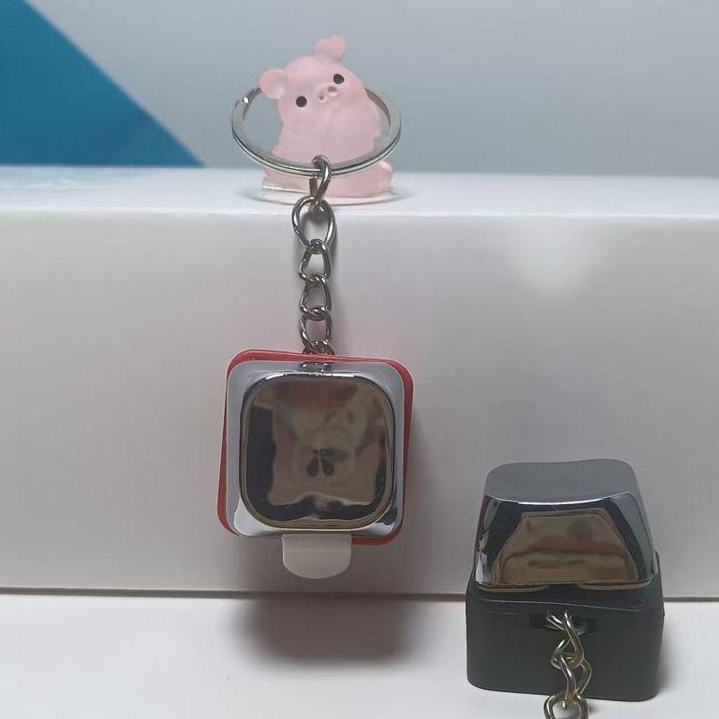 Elektrický šok Elektrická klávesnice Klíčenka Street Trick Novinka Fidget Klíčenka Šokující Podání ruky Trick Klikací hračka 1 ks