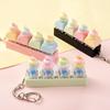 Cartoon Bread Button Squeeze Toy Keychain: Stress Relief and Distraction Gadget