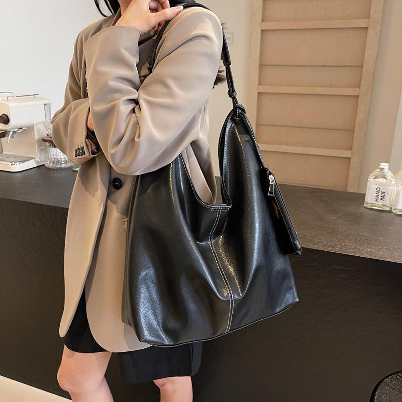 2025 new high-end soft leather shoulder tote bag large-capacity casual bucket lazy crossbody commuter armpit
