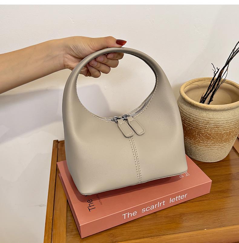 

2025 Женская мини-сумка-пельмень для ношения в руке: Новая Мода, Универсальная, Повседневная, Легкая Сумка. серый