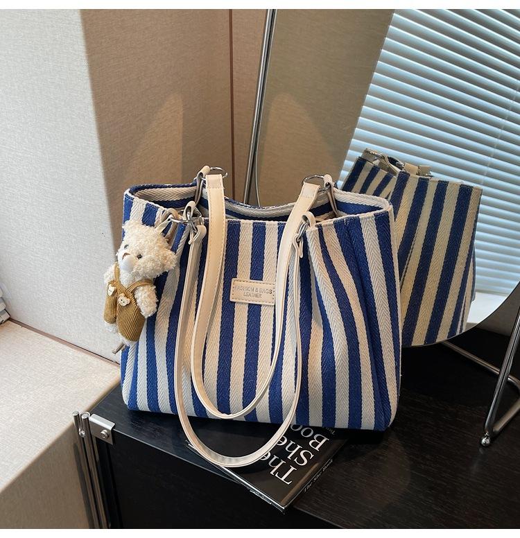 

Летние сумки-тоут для женщин 2025 года, дизайнерская сумка-шоппер через плечо, женская повседневная холщовая сумка With Pendant синий