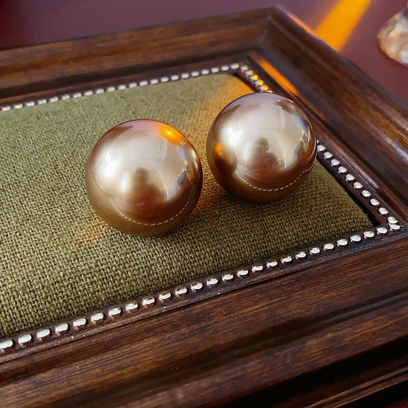 

Серебряные серьги с жемчугом «Игла» — французская ретро-мода, элитная роскошь, простой, но элегантный дизайн. Diameter 25mm шампанского