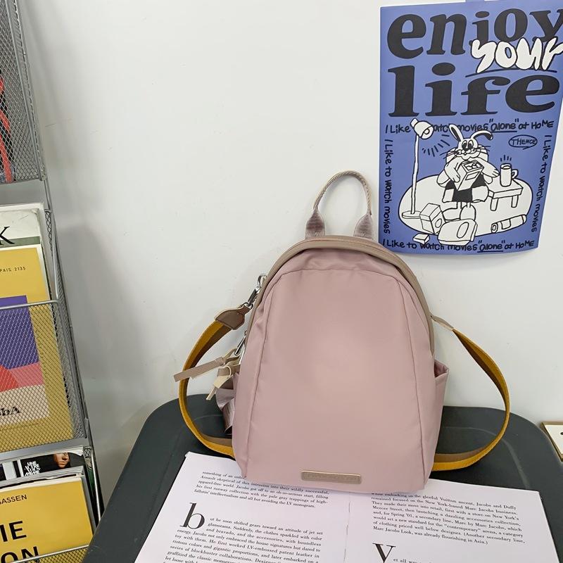 

Fashion schoolbag female middle school student Japanese simple ins style niche solid color backpack female junior high school student retro Mori Single pack розовый
