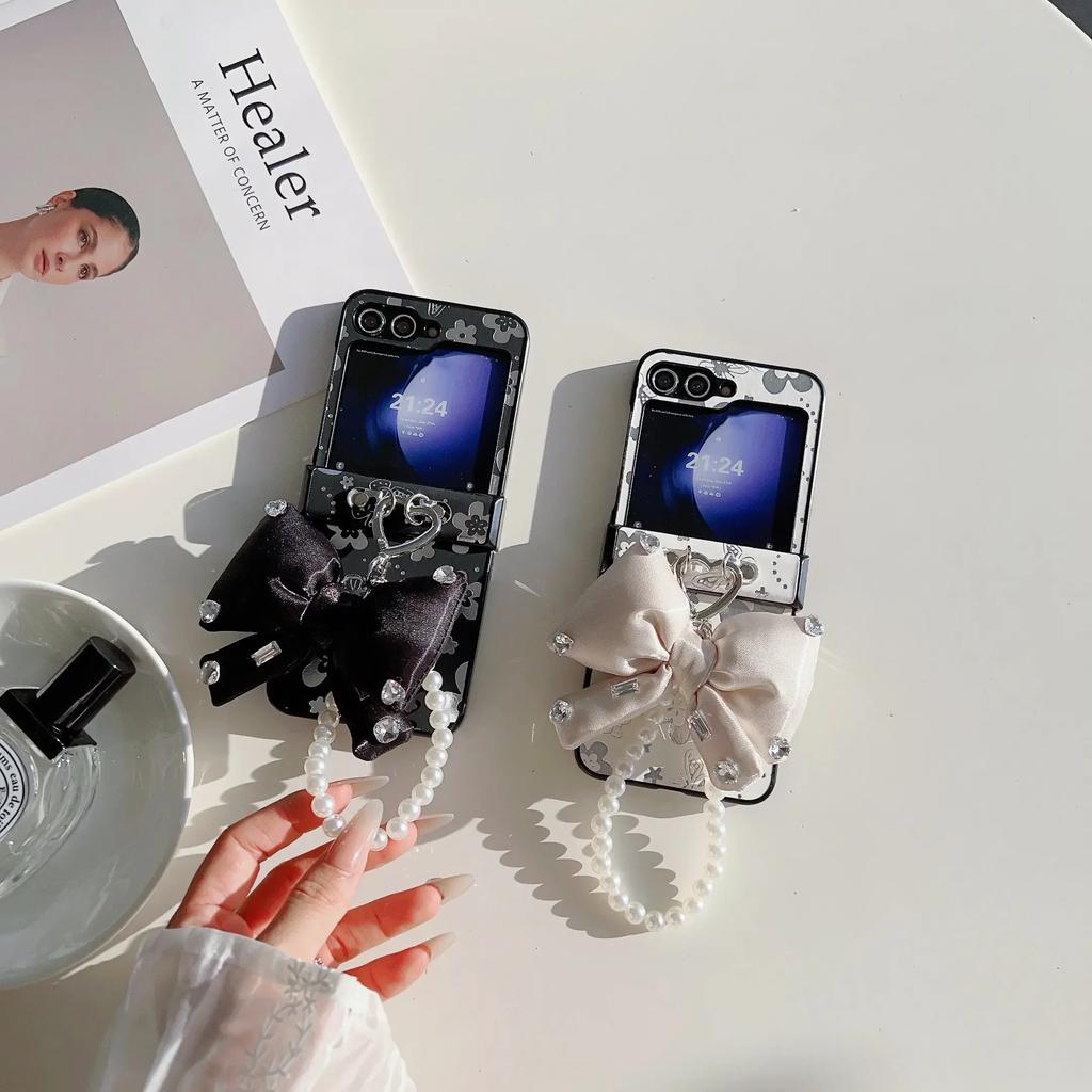 PU Leather Luxury Cover with Bowknot Pearl Wrist Chain Strap Bracelet For Samsung Galaxy Z Flip 6 5 4 3 Phone Case